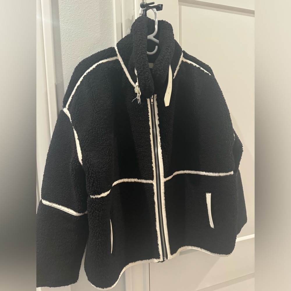 Elan, black Sherpa, trimmed in white leather bomber jacket, M